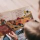 children exploring sound discrimination using Montessori sound cylinders